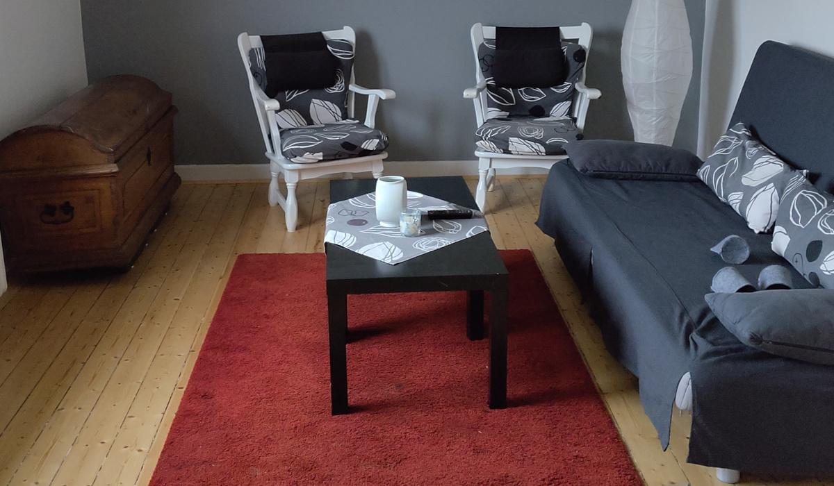 Wohnzimmer Ferienwohnung Bücherwurm
